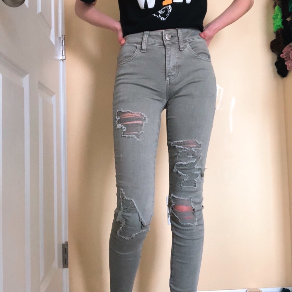 olive green ripped jeans
